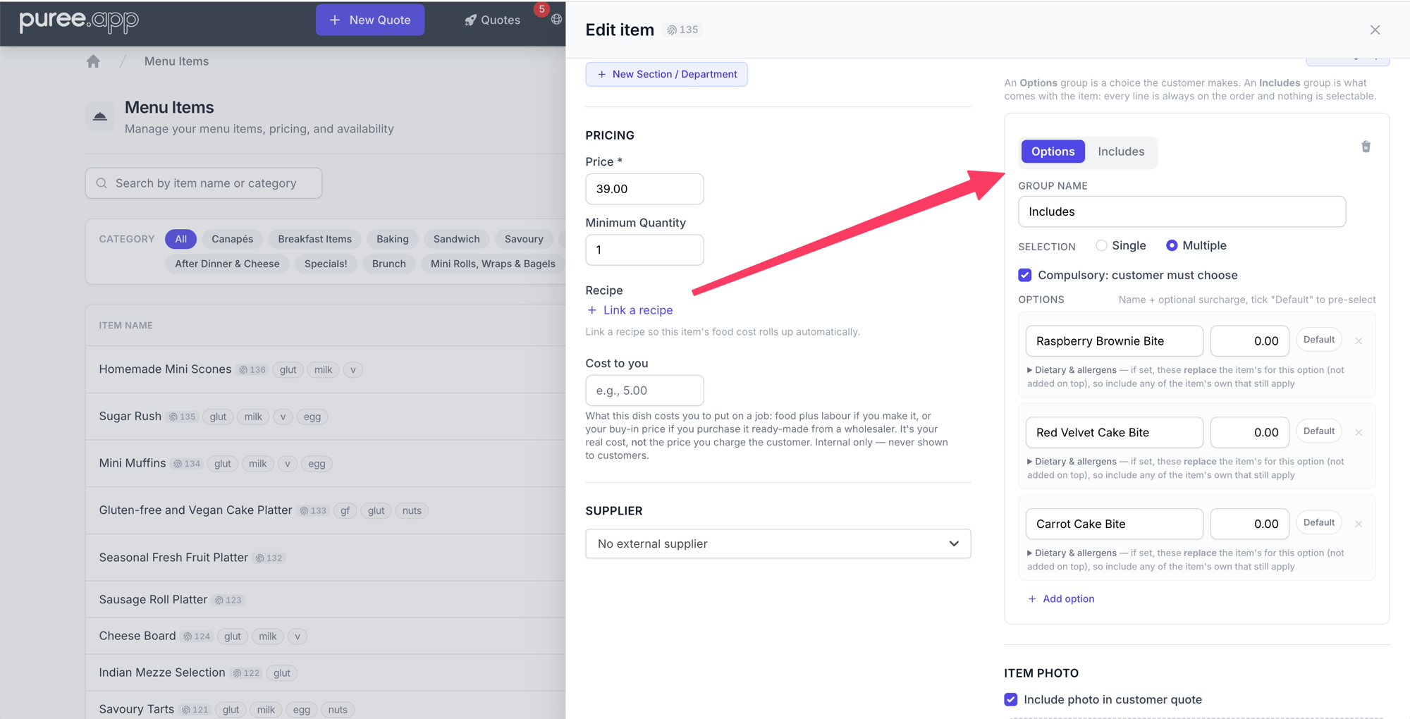 The Edit item panel with an option group card, an arrow pointing to the Options / Includes toggle at the top of the card. Below it the group name field reads 'Includes', with Multiple selection, Compulsory ticked, and three option rows each with a price field and a Default pill